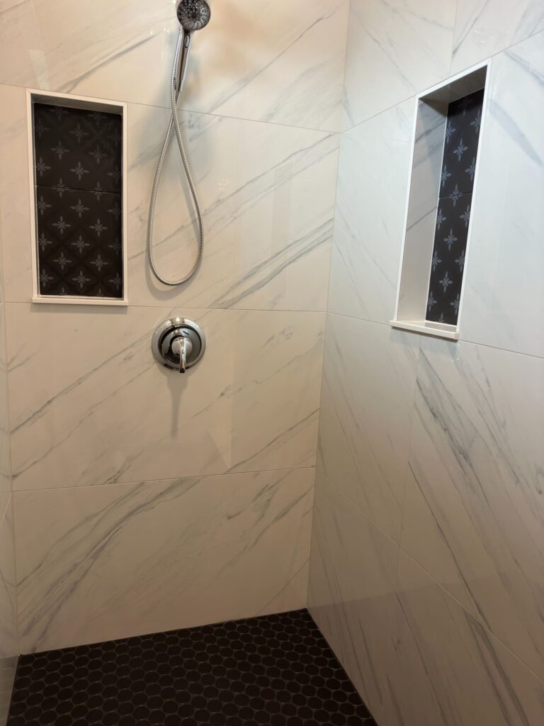 photo 7 from the Penny Swirl bathroom remodeling project by ARTOS