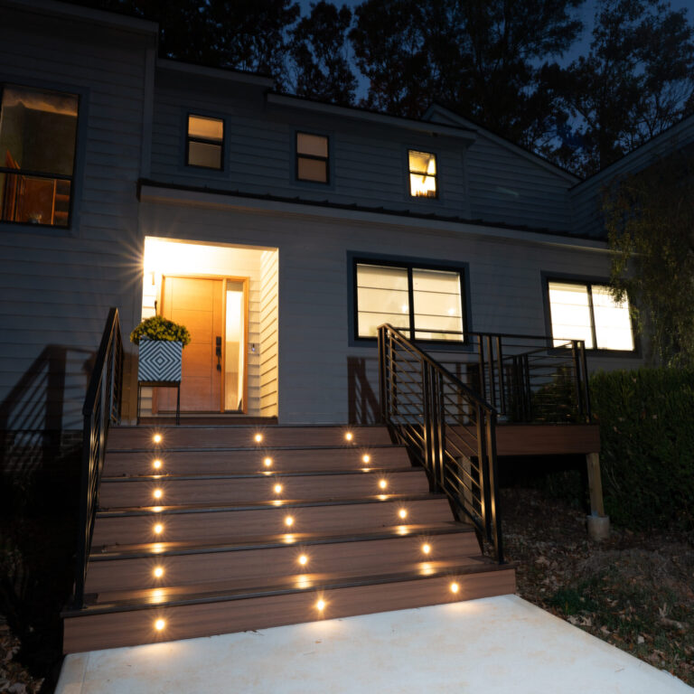 Outdoor deck with integrated step lighting